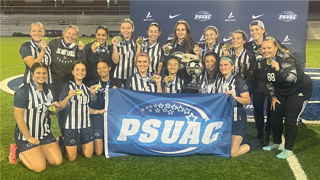 Penn State Schuylkill won the 2024 PSUAC Women's Soccer Championship at Panzer Stadium on November 5th, 2024. The team is pictured with its trophy and the PSUAC flag.